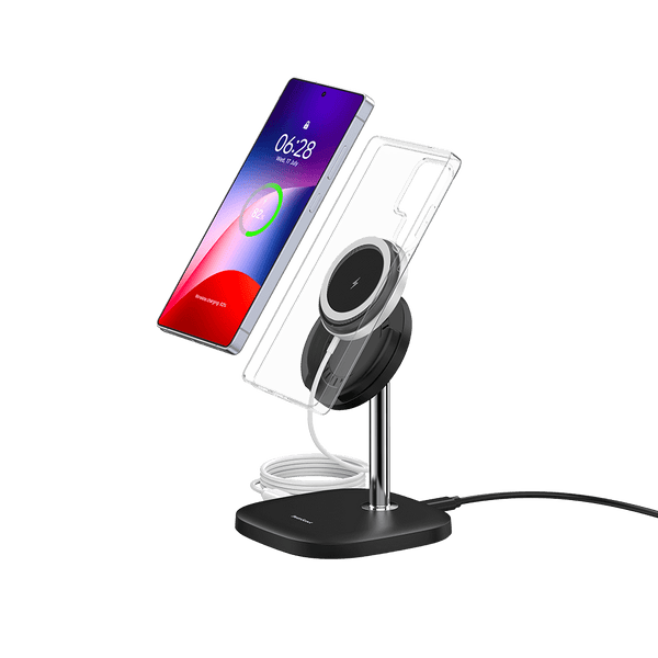 A Samsung phone with magnetic case on a charging stand
