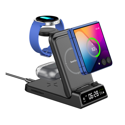SwanScout 703F charging station simultaneously powering a Samsung Galaxy Z Flip 7, Galaxy Watch Ultra, and Buds 3 Pro with an integrated digital clock